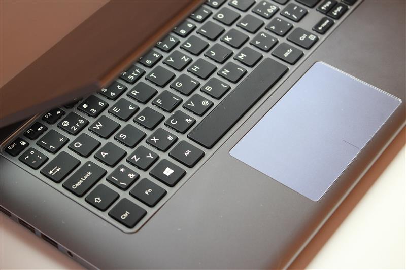 Look at keyboard of half closed laptop