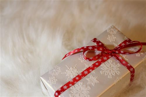 Christmas gift with red ribbon