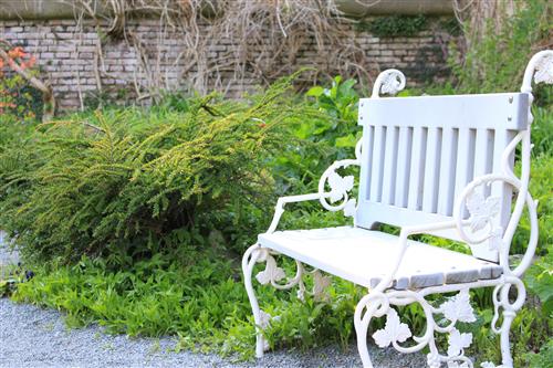 White romantic bench in the park
